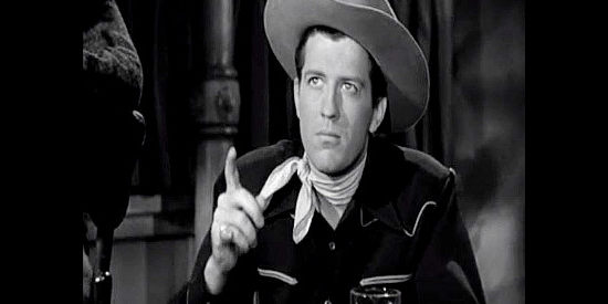 Russell Wade as Clint Harolday, a young man who has a dispute over poker with Rocklin in Tall in the Saddle (1944)