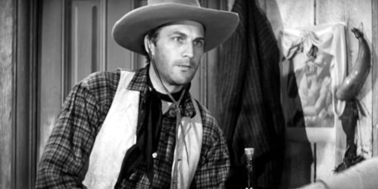 Tom Tyler as King Evans, the man who sells Cole Harden a stolen horse in The Westerner (1940)