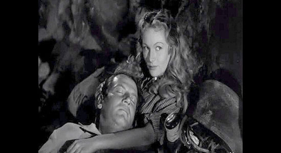 Veronica Lake as Connie, caring for a wounded Dave Nash (Joel McCrea) in Ramrod (1947)