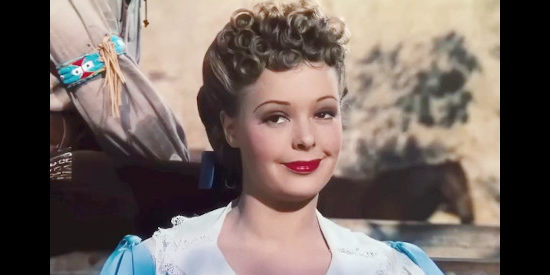 Virginia Gilmore as Sue Creighton, wise to the trick her friends are about to play on a greenhorn in Western Union (1941)