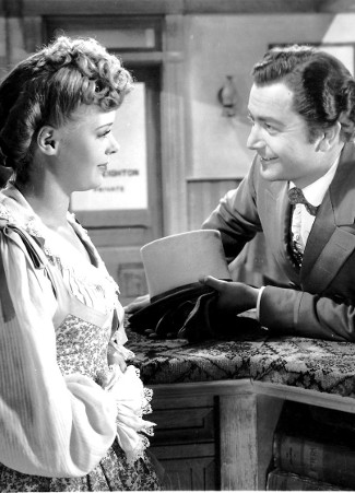 Virginia Gilmore as Sue Creighton with Robert Young as Richard Blake in Western Union (1941)