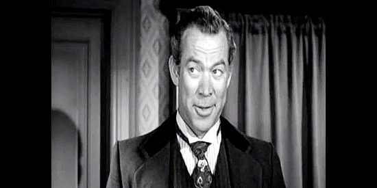 Ward Bond as Judge Robert Garvey, trying to gain control of the Cardell ranch in Tall in the Saddle (1944)