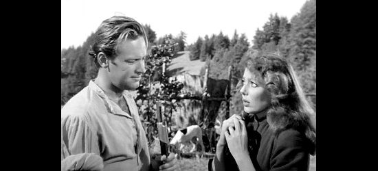 William Holden as David Harvey trying to teach Rachel (Loretta Young) the cabin in danger whistle in Rachel and the Stranger (1948)