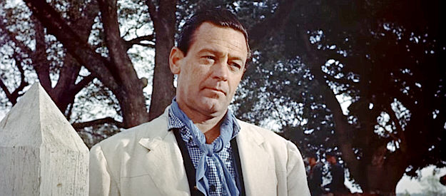 William Holden as Maj. Henry Kendall, assigned to the mission and regarded as a nuisance by Col. John Marlowe in The Horse Soldiers (1959)