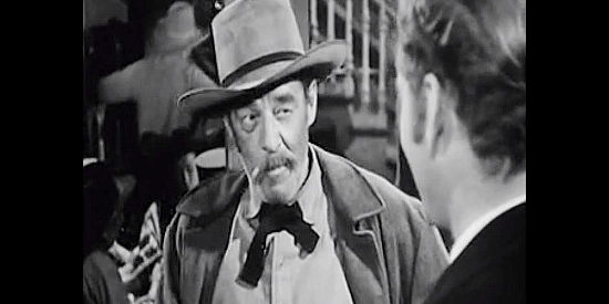 Al Bridge as Sam Slade, the owner of a freight business who loses it to Mike McComb in Silver River (1948)