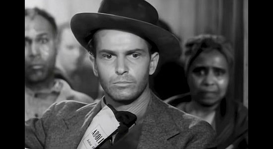 Alan Baxter as Oliver Brown, trying to smuggle slaves into bloody Kansas in Santa Fe Trail (1940)