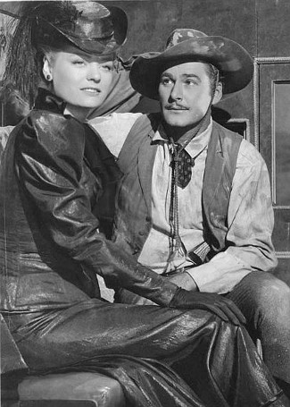 Alexis Smith as Jeanne Starr with Errol Flynn as Clay Hardin in San Antonio (1945)