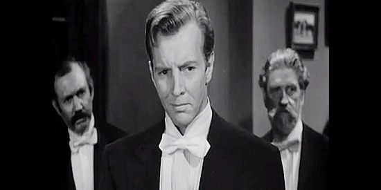 Bruce Bennett as Stanley Moore, Georgia's husband and the biggest obstacle to Mike McComb's romantic intentions in Silver River (1948)