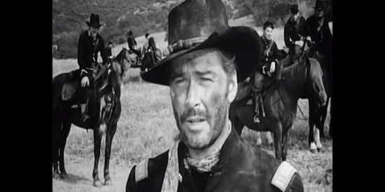 Errol Flynn as Union officer Mike McComb, who burns a payroll to keep it from falling into Confederate hands and gets courtmartialed for his efforts in Silver River (1948)