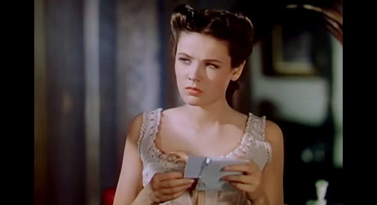Gene Tierney as Eleanor Stone, pondering a meeting with the very much alive Frank James in The Return of Frank James (1940)
