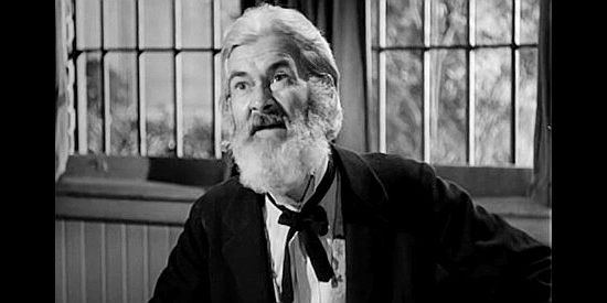 George 'Gabby' Hayes as John J. Pettit, considering whether to give a friend a loan in Return of the Bad Men (1948)