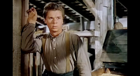 Jackie Cooper as Clem, the young man who insists on following Frank in the pursuit of Jesse's killers in The Return of Frank James (1940)
