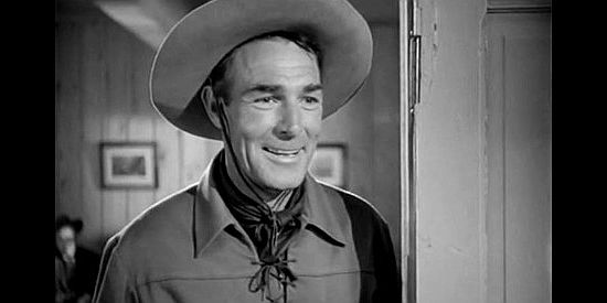 Randolph Scott as Vance Cordell, thrilled to see Cheyenne paroled and working in his office in Return of the Bad Men (1948)