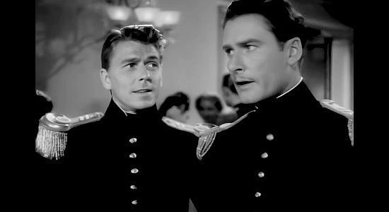 Ronald Reagan as George Armstrong Custer and Errol Flynn as Jeb Stuart, friends on the battlefield, vying for the same woman off it in Santa Fe Trail (1940)