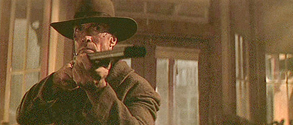 Clint Eastwood as Bill Munny, completing the transformation back to vicious killer in Unforgiven (1992)