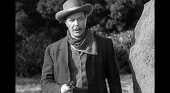 Dick Curtis as Jim Swade, one of the bandits after the mail wagon in Jackass Mail (1942)