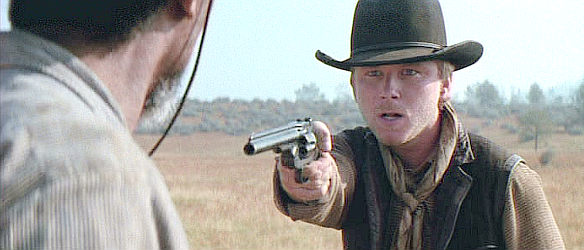 Jaimz Woolvett as The Schofield Kid, about to prove a point with his six-gun in Unforgiven (1992)