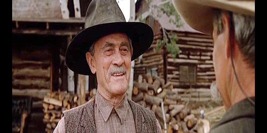 Ken Curtis as Seaborn Tay, meeting Conagher and eager to hire an honest ranch hand in Conagher (1991)