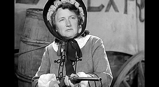 Marjorie Main as Clementine 'Tiny' Tucker, defending her mail wagon in Jackass Mail (1942)