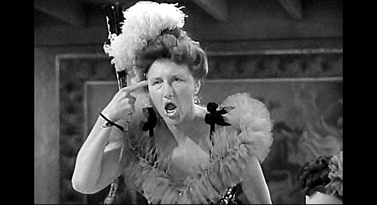 Marjorie Main as Clementine 'Tiny' Tucker, leading the Girls of the Golden West in song and dance in Jackass Mail (1942)
