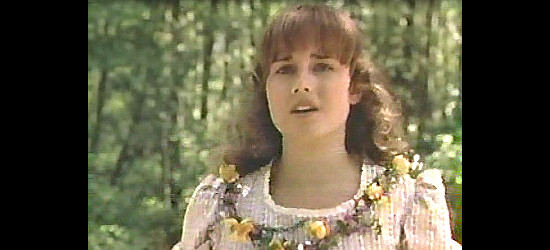 Nikki Deloach as Kristen Yarnell in Gunfighter's Moon (1991)