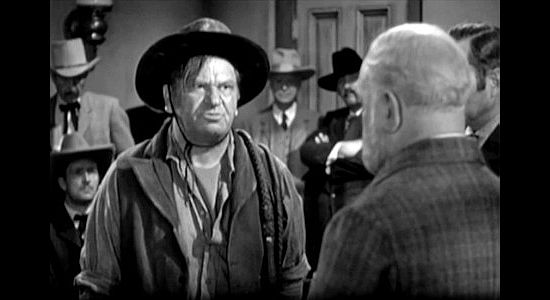 Wallace Beery as Bill Bragg, demanding back pay from Jackass Brown in 20 Mule Team (1940)
