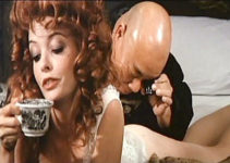 Al Tung as Wang checks the tattoo of his Russian mistress (Betty Sheppard) in Stranger and the Gunfighter (1974)