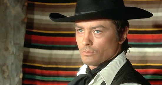 Alain Delon as Gauche, a man with a prize sword, a new enemy and a missing mistress in Red Sun (1971)