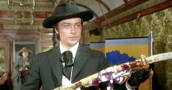Alain Delon as Gauche, finds the real prize during a train robbery in Red Sun (1971)