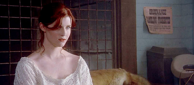 Amber Taylor as Tess Bonaventure, Valentine's girlfriend in Los Tragos until the Henrys come calling in South of Heaven, West of Hell (2000)