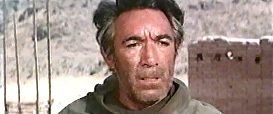 Anthony Quinn as Leon Alastray, finding himself all alone in the ruins of San Sebastian in Guns for San Sebastian (1967)