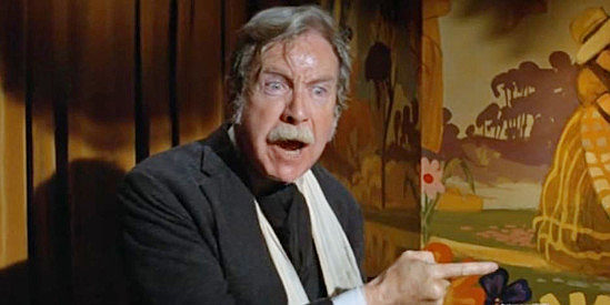 Arthur O'Connell as Mr. Lomax, recognizing the man who robbed him frolicking with two women in a brothel in There Was a Crooked Man (1970)