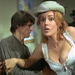 Barbara Rhodes as the school teacher in distress in There Was a Crooked Man (1971)
