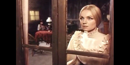 Betsy Bell as Gladys, the sheriff's daughter, wondering if a rescue is coming in Taste of Death (1968)