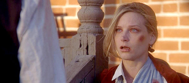 Bridget Fonda as Adalyne Dunfries, trying to encourage Valentine Casey to follow her to San Francisco in South of Heaven, West of Hell (2000)