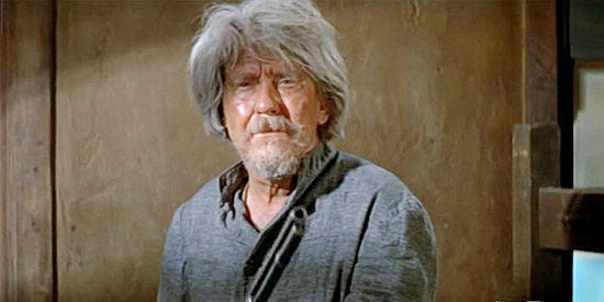 Burgess Meredith as The Missouri Kid, carrying out his mission during the jailbreak in There Was a Crooked Man (1970)