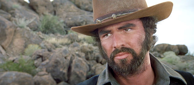 Burt Reynolds as Jay Brogart, trying to figure out what to do with the woman in The Man Who Loved Cat Dancing (1973)