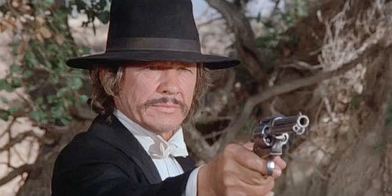 Charles Bronson as Graham Dorsey, about to switch identities with a dentist in From Noon Till Three (1975)