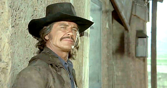 Charles Bronson as Link, catching his first glimpse of a samurai in Red Sun (1971)