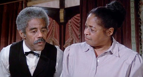 Davis Roberts as Sam and Betty Cole as Edna, Amanda's servants in From Noon Till Three (1975)