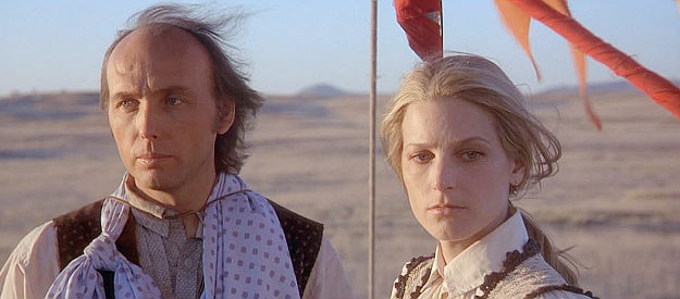 Dwight Yoakam as Valentine Casey and Bridget Fonda as Adalyne Dunfries on a hot air baloon ride in South of Heaven, West of Hell (2000)
