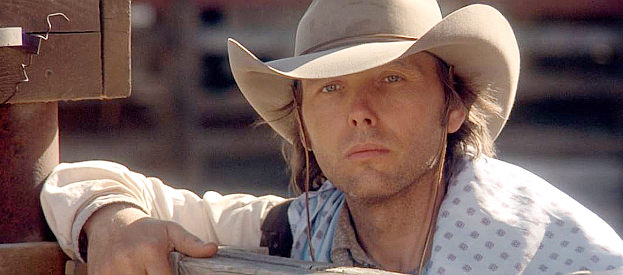 Dwight Yoakam as Valentine Casey, catching his first glimpse of Adalyne Dunfries in South of Heaven, West of Hell (2000)