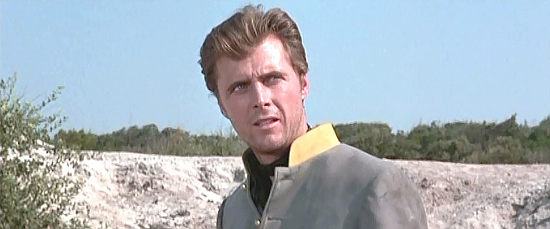 Edd Byrnes as Chattanooga Jim, working with his partners to swindel a Union patrol in Blood Red, Yellow Gold (1967)