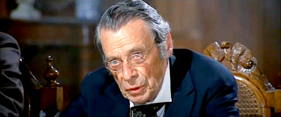 Eduardo Ciannelli as Commissioner Boone, renewing mining rights in Boot Hill (1969)
