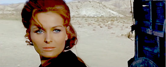 Erika Blanc as Sally, rescuer of two men stranded in the desert in The Longest Hunt (1968)