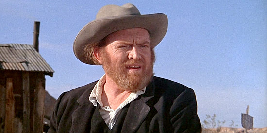 Gene Evans as Clete, looking for the reverend who soiled his wife in The Ballad of Cable Hogue (1970)