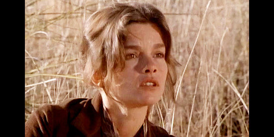 Genevieve Bujold as Jeanne, reacting to the sound of a gunshot in Another Man, Another Chance (1977)