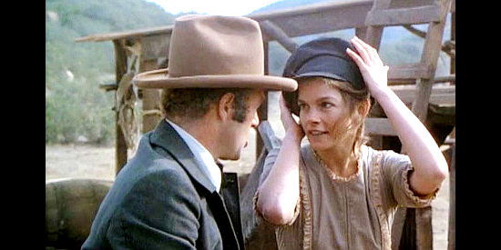 Genevieve Bujold as Jeanne, trying to explain the proper pronunciation of her name to David Williams (James Caan) in Another Man, Another Chance (1977)