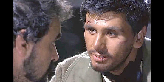 George Eastman as Django, trying to gain the confidence of the bandit El Santo in Django Kills Softly (1968)