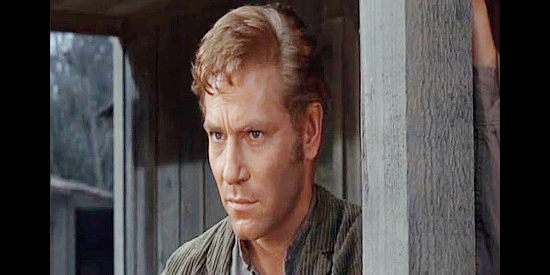 George Segal as Matt Weaver, finding his help needed by the people he's been fighting in Invitation to a Gunfighter (1964)